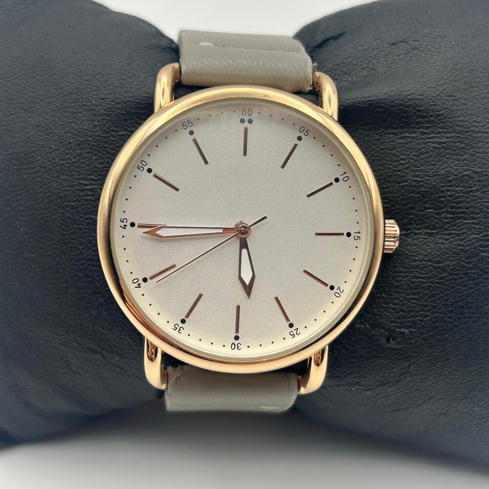 Ladies Classic Quartz Wristwatch Gold Tone Case Gray Leather Band Analog